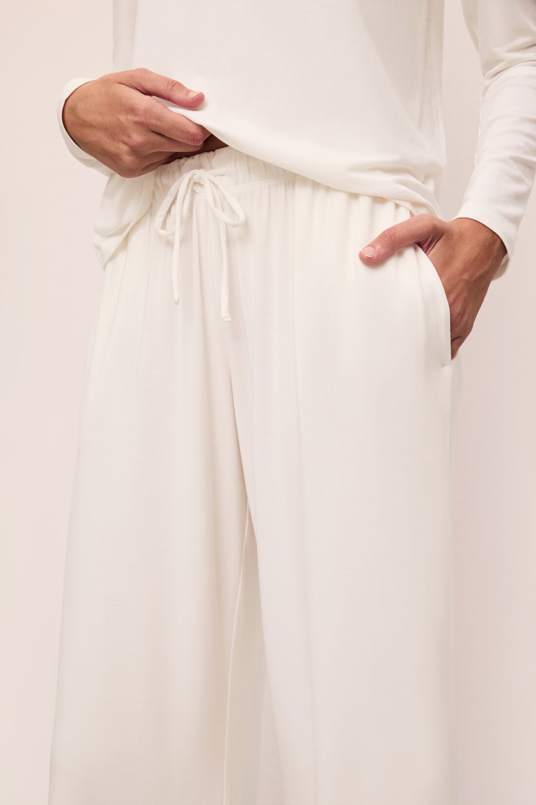 Model is wearing Gisele Tencel™ Modal Everyday Straight Leg Pant in Ivory