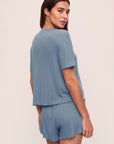 Model is wearing Pointelle Short Sleeve Tee in Faded Denim
