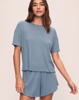 Model is wearing Pointelle Short Sleeve Tee in Faded Denim