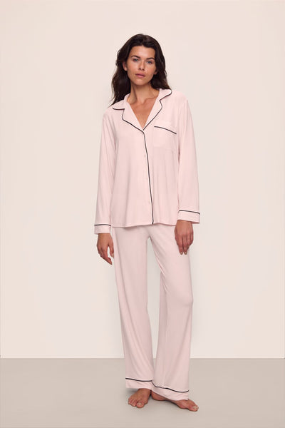 Model is wearing Gisele TENCEL™ Modal Long PJ Set in Sorbet Pink/Black