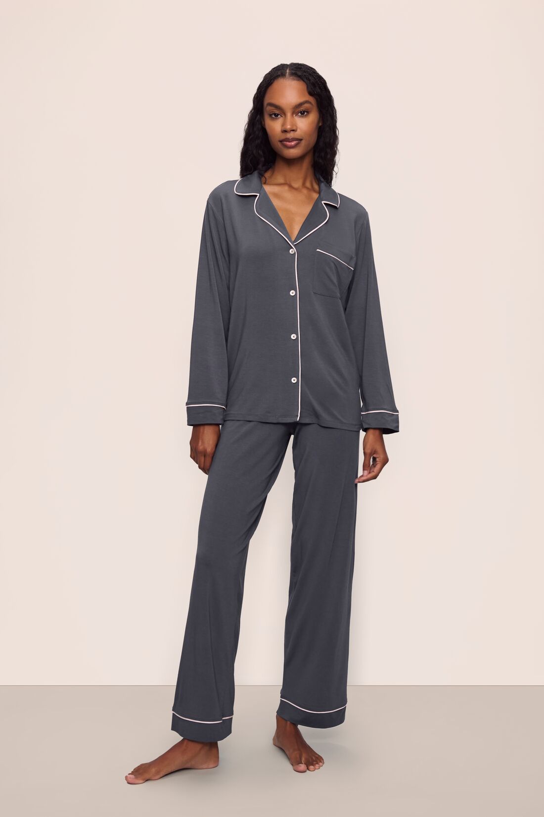 Model is wearing Gisele TENCEL™ Modal Long PJ Set in Graphite/Sorbet Pink