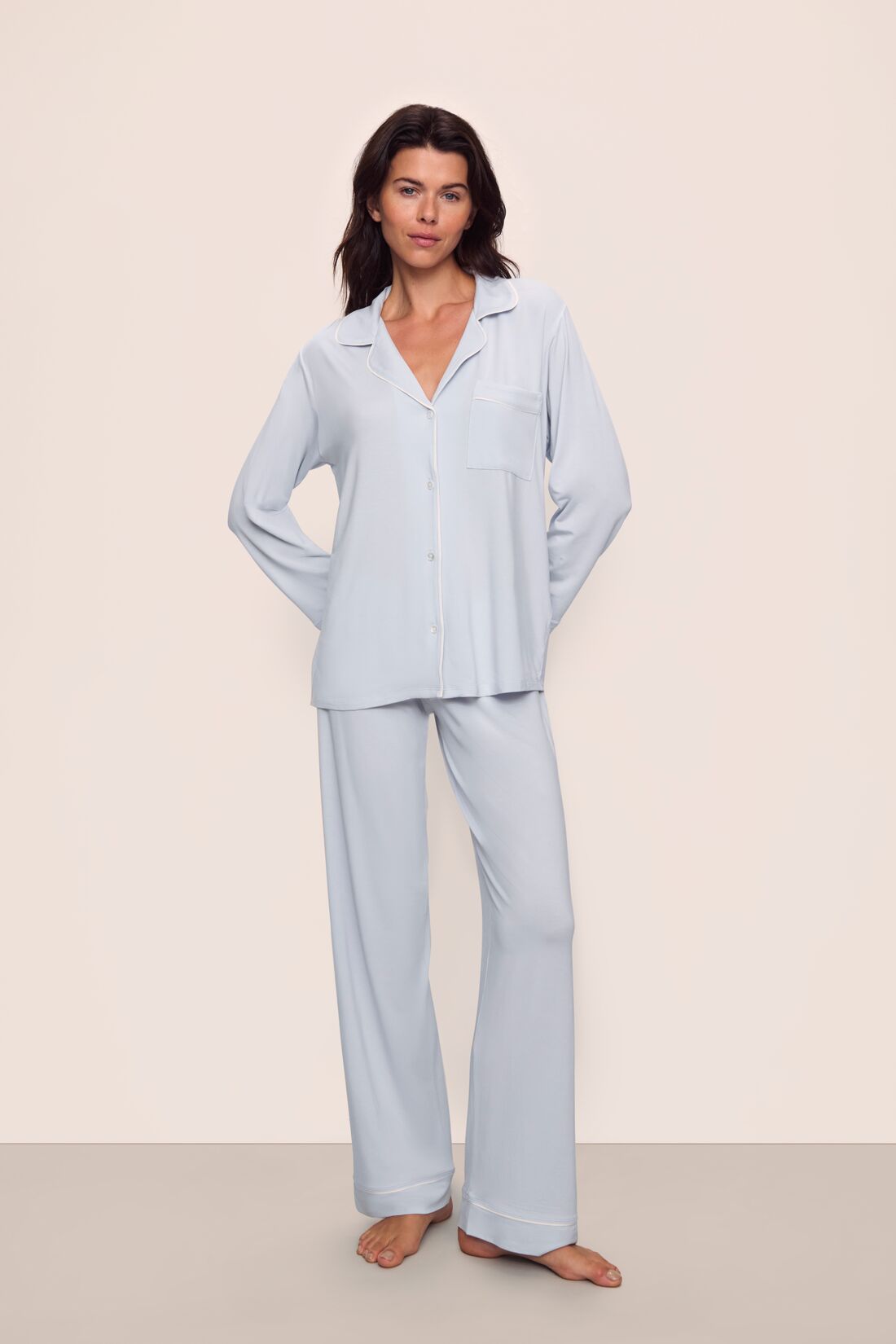 Model is wearing Gisele TENCEL™ Modal Long PJ Set in Ice Blue/Ivory