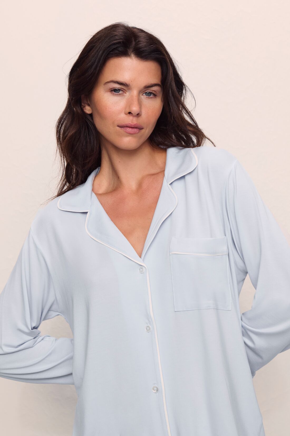 Model is wearing Gisele TENCEL™ Modal Long PJ Set in Ice Blue/Ivory