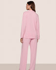 Model is wearing Gisele TENCEL™ Modal Long PJ Set in Pink Nectar/Ivory