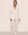 Model wears Gisele TENCEL™ Modal Long PJ Set in Pure Ivory/Navy