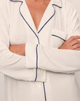 Model wears Gisele TENCEL™ Modal Long PJ Set in Pure Ivory/Navy