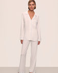Model is wearing Gisele TENCEL™ Modal Long PJ Set in White/Ice Blue