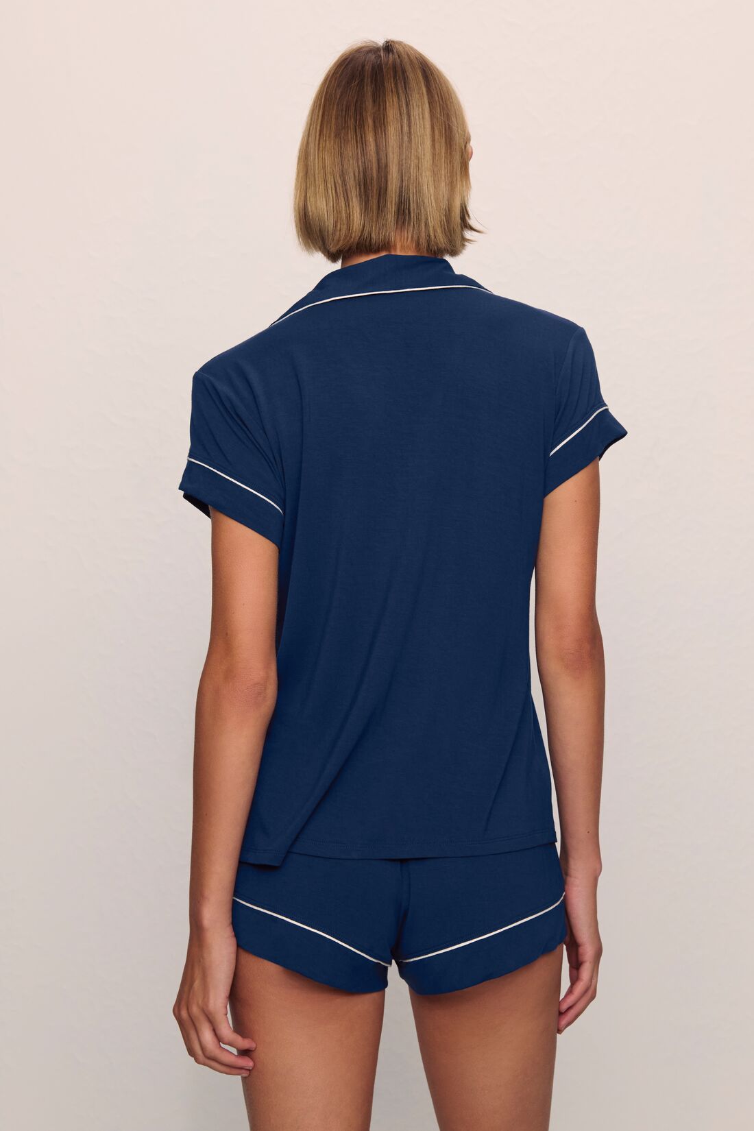 Model is wearing Gisele TENCEL™ Modal Shortie Short PJ Set in Navy/Ivory