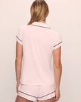 Model is wearing Gisele TENCEL™ Modal Shortie Short PJ Set in Sorbet Pink/Black