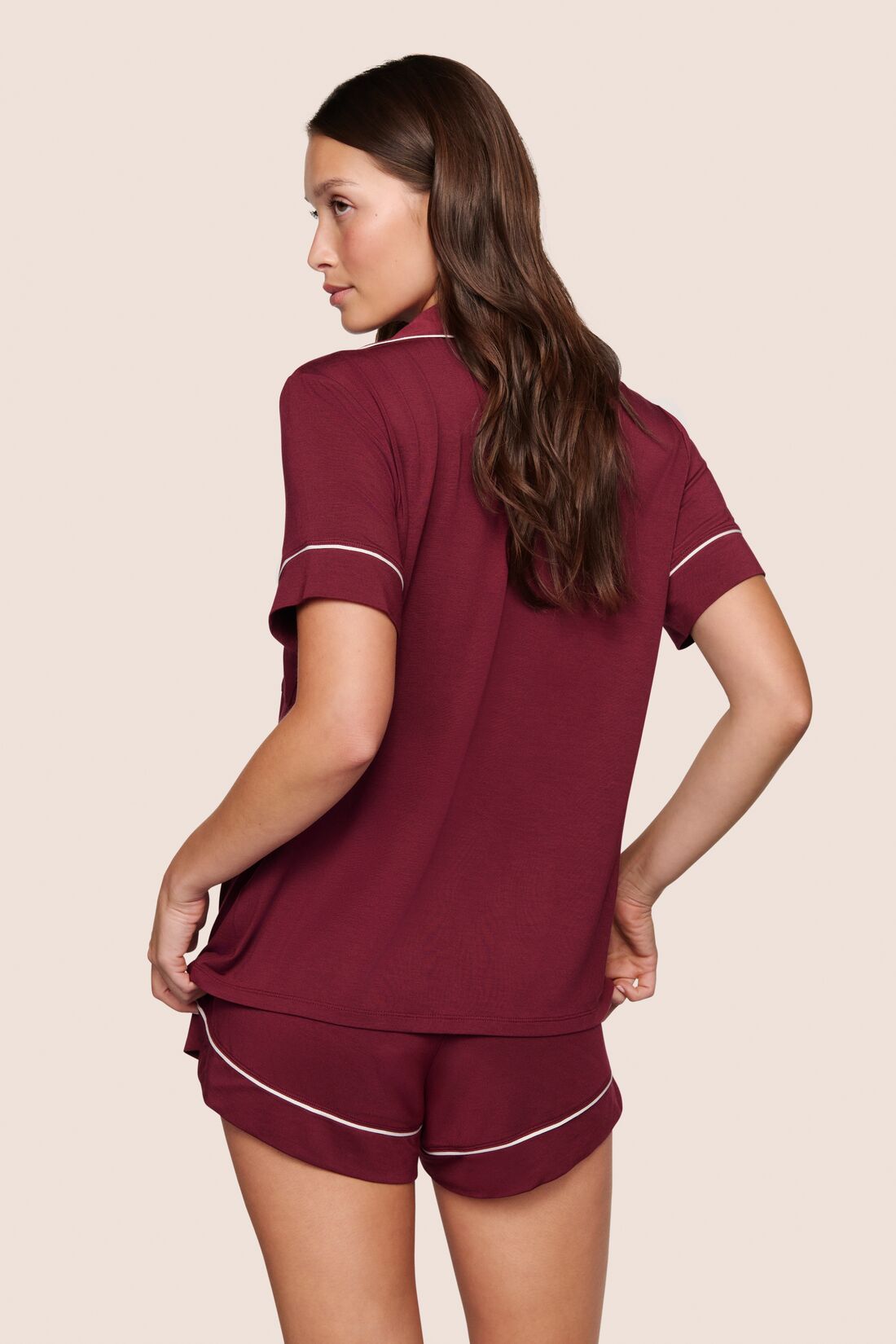 Model is wearing Gisele TENCEL™ Modal Relaxed Short PJ Set  in Bordeaux/Ivory