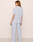 Model is wearing Gisele TENCEL™ Short Sleeve Pant PJ Set in Ice Blue/Ivory