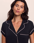 Model is wearing Gisele TENCEL™ Modal Short Sleeve Cropped PJ Set in Black/Sorbet Pink