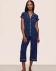 Model is wearing Gisele TENCEL™ Modal Short Sleeve Cropped PJ Set in Navy/Ivory