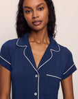 Model is wearing Gisele TENCEL™ Modal Short Sleeve Cropped PJ Set in Navy/Ivory