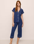 Model Is Wearing Gisele Short Sleeve Crop PJ Set In Navy/Ivory