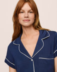 Model is wearing Gisele TENCEL™ Shortie Short PJ Set in Navy/Ivory