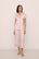 Model Is Wearing Gisele Short Sleeve Crop Pj Set In Sorbet Pink/Black