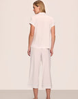 Model is wearing Gisele TENCEL™ Modal Short Sleeve Cropped PJ Set in White/Ice Blue
