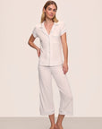Model is wearing Gisele TENCEL™ Modal Short Sleeve Cropped PJ Set in White/Ice Blue
