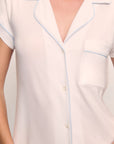 Model is wearing Gisele TENCEL™ Modal Short Sleeve Cropped PJ Set in White/Ice Blue