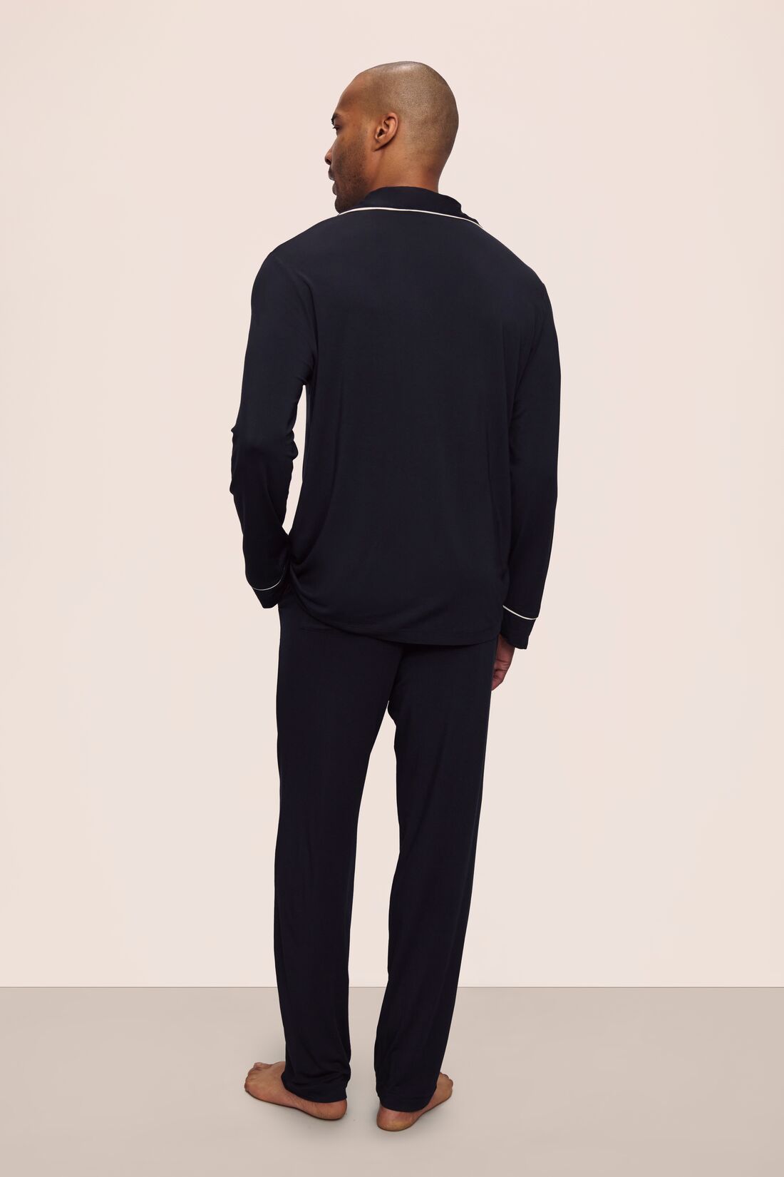 Model is wearing William TENCEL™ Modal Long PJ Set in Black/Ivory
