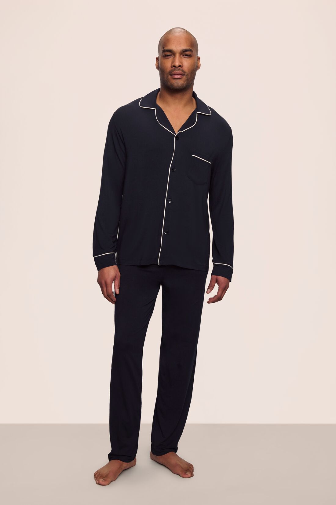 Model is wearing William TENCEL™ Modal Long PJ Set in Black/Ivory