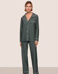 Model is wearing Gisele Printed TENCEL™ Modal Long PJ Set in Duo Stripe Pine/Ivory