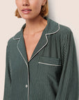 Model is wearing Gisele Printed TENCEL™ Modal Long PJ Set in Duo Stripe Pine/Ivory