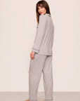 Model is wearing Gisele Printed TENCEL™ Modal Long PJ Set in Geo Sphere Gray Dawn