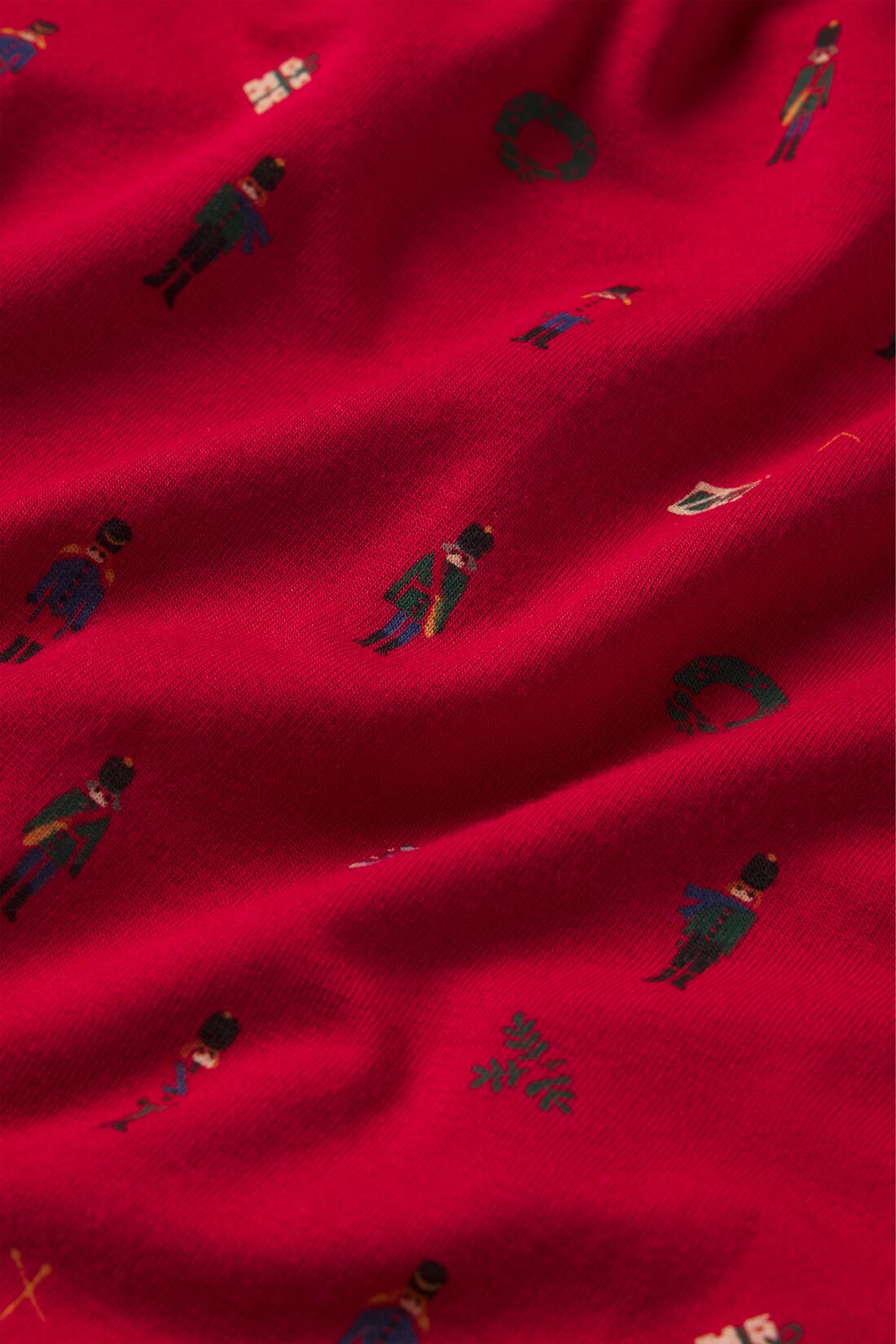 Fabric detail shot of Nutcracker Holly Red