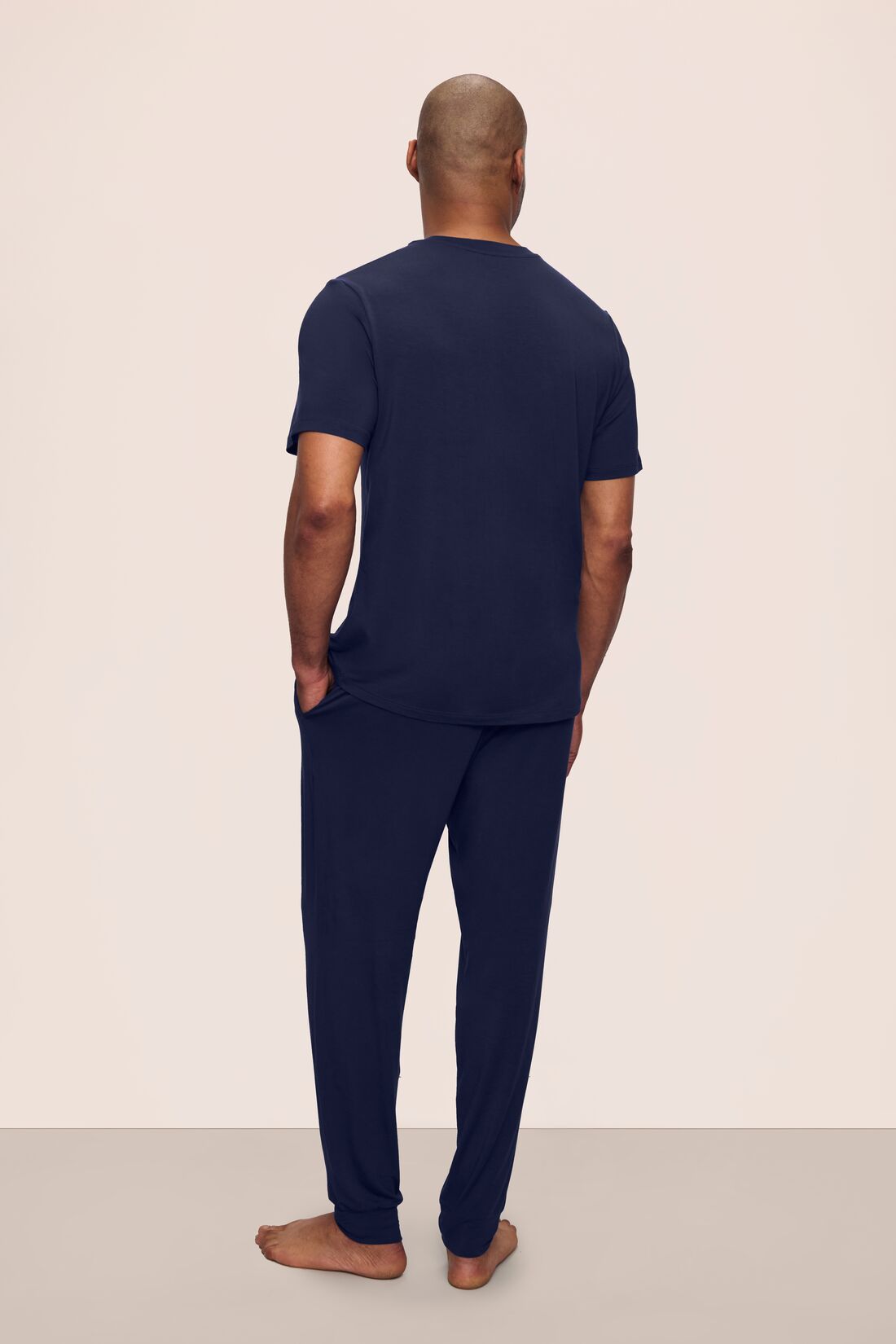 Model is wearing Henry TENCEL™ Modal Short Sleeve & Pant PJ Set in Navy