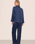 Model is wearing Inez Washable Silk Long PJ Set in Navy/Champagne