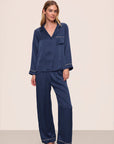 Model is wearing Inez Washable Silk Long PJ Set in Navy/Champagne