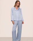 Model is wearing Inez Washable Silk Long PJ Set in Powder Blue/Champagne