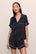 Model is wearing Inez Washable Silk Short PJ Set in Black/Champagne