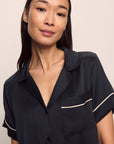 Model is wearing Inez Washable Silk Short PJ Set in Black/Champagne