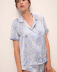 Model wears Inez Washable Silk Printed Short PJ Set in Malachite Wedgewood Blue/Ivory.