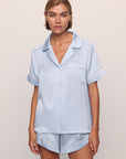 Model is wearing Inez Washable Silk Short PJ Set in Powder Blue/Champagne