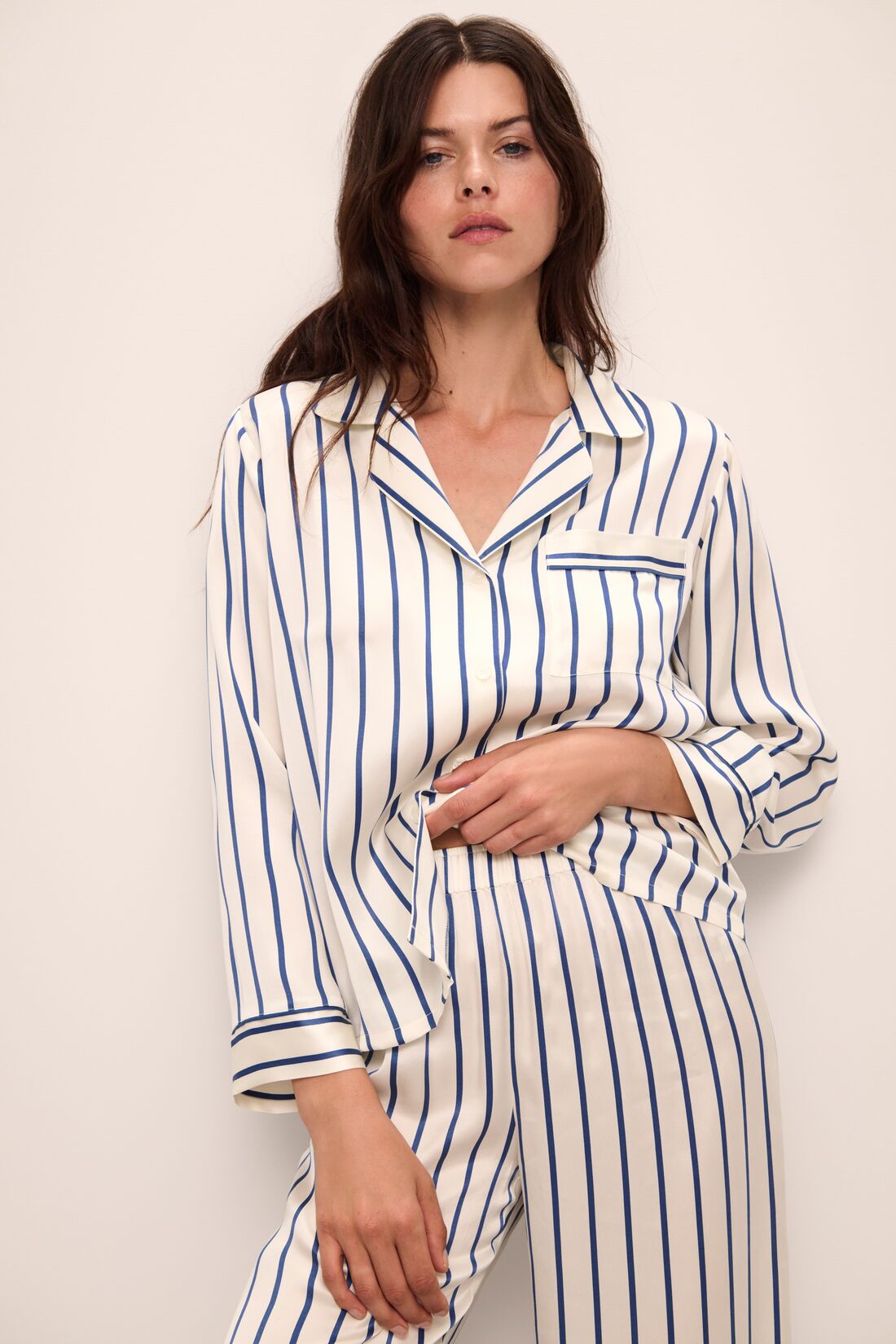 Model wears Inez Washable Silk Printed Long PJ Set in Classic Stripe Ivory/Denim Blue.