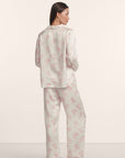 Model is wearing Inez Washable Silk Printed Long PJ Set in Rose Garden Cameo Pink/Pale Pi