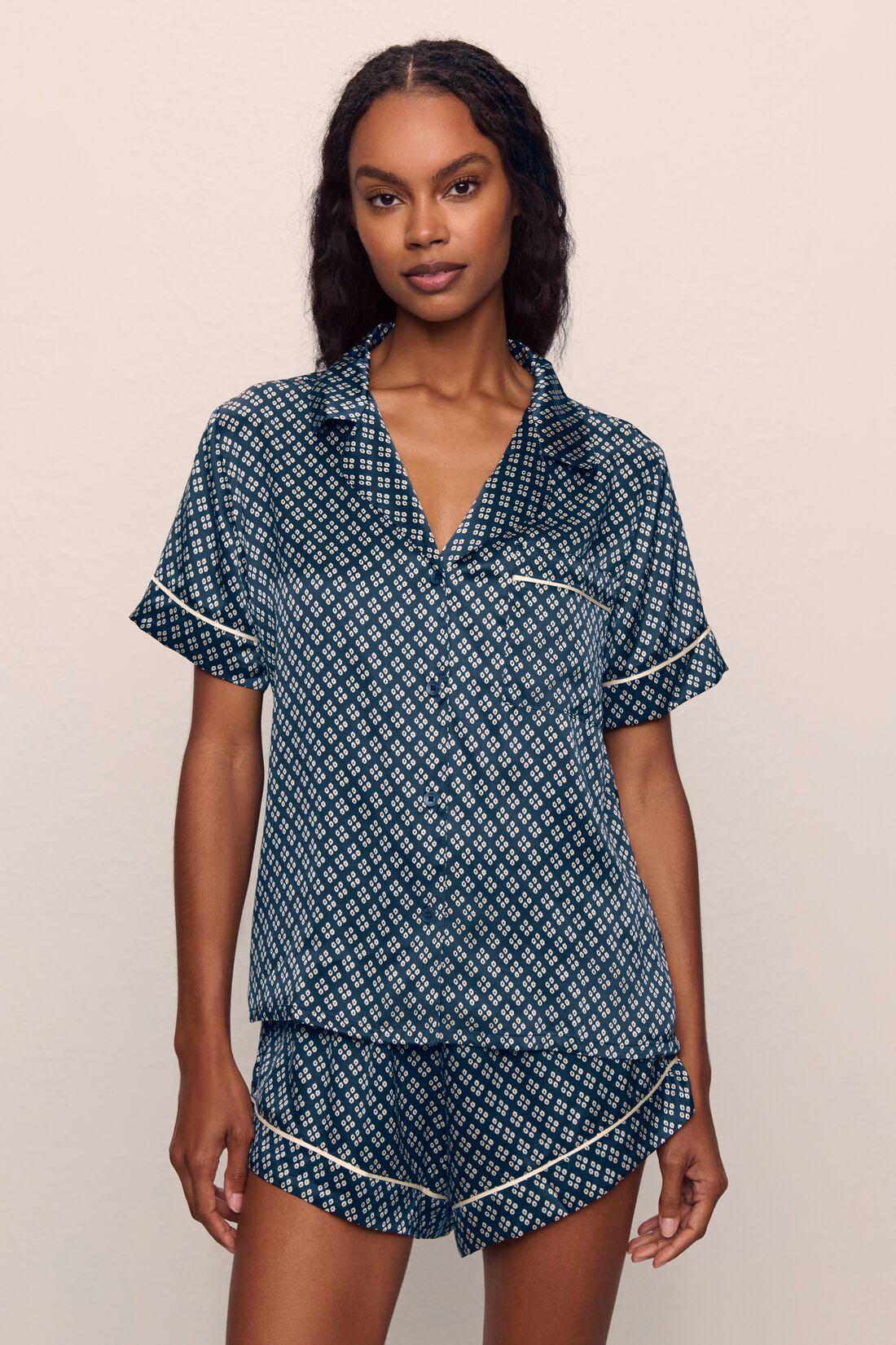 Model is wearing Inez Washable Silk Printed Short Set in Petite batik Navy/Ivory