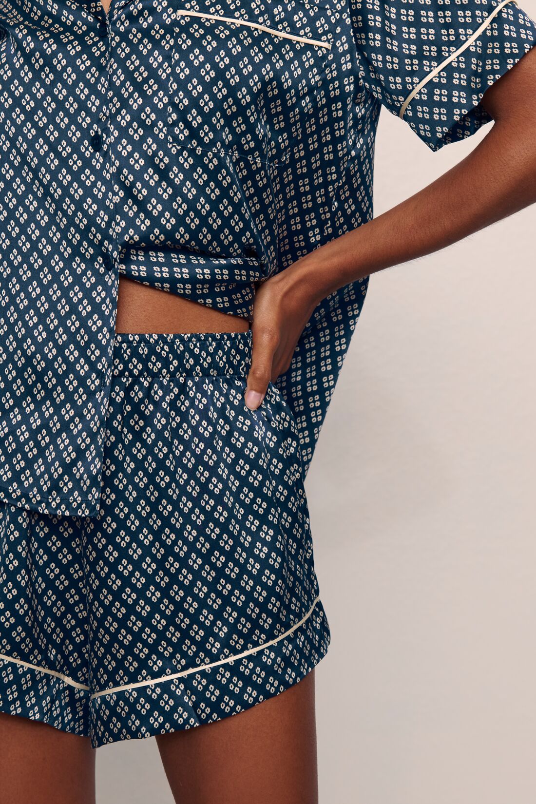 Model is wearing Inez Washable Silk Printed Short Set in Petite batik Navy/Ivory