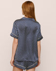 Model Is Wearing Inez Printed Short Pj Set In Petite Batik Indigo Blue