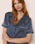 Model Is Wearing Inez Printed Short Pj Set In Petite Batik Indigo Blue