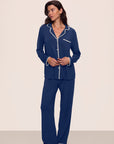 Model is wearing Frida TENCEL™ Modal Long PJ Set in Navy/Ivory