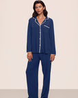 Model is wearing Frida TENCEL™ Modal Long PJ Set in Navy/Ivory