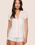 Model is wearing Frida TENCEL™ Modal Shortie Short PJ Set in Ivory/Pink Nectar