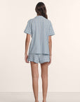 Model is wearing Nautico Shortie Short PJ Set in Classic Stripe Slate Blue/Ivor