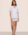 Model is wearing Nautico Shortie Short PJ Set in White/Cornflower Blue