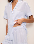 Model is wearing Nautico Shortie Short PJ Set in White/Cornflower Blue
